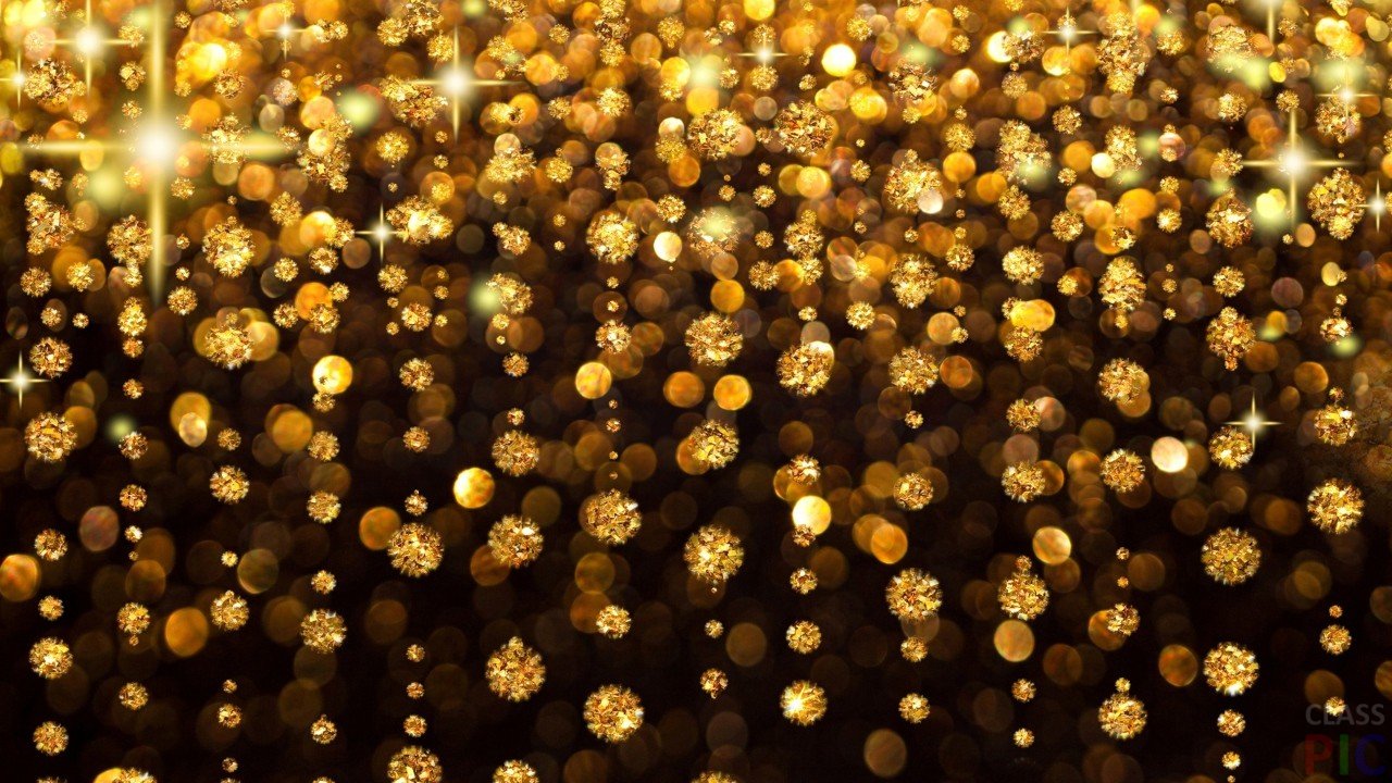 Золотой дождь (фото жидкости золотистого цвета с красивыми брызкгами или струей)